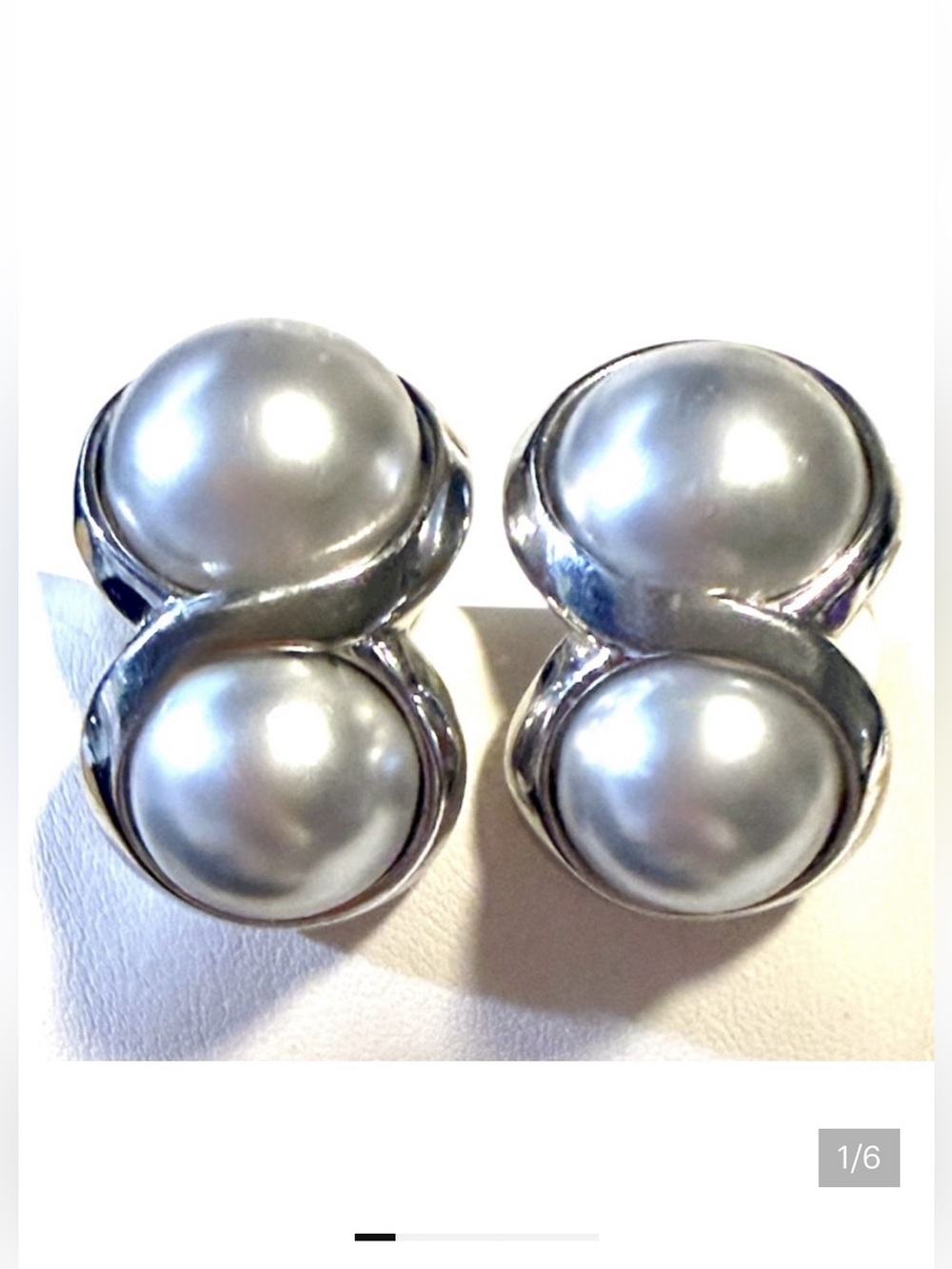 Vintage Crown Trifari clip-on earrings silver-tone Women’s costume jewelry
